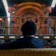 Spike (John Cho) faces away from the camera aboard the Bebop in this scene from Netflix's Cowboy Bebop.